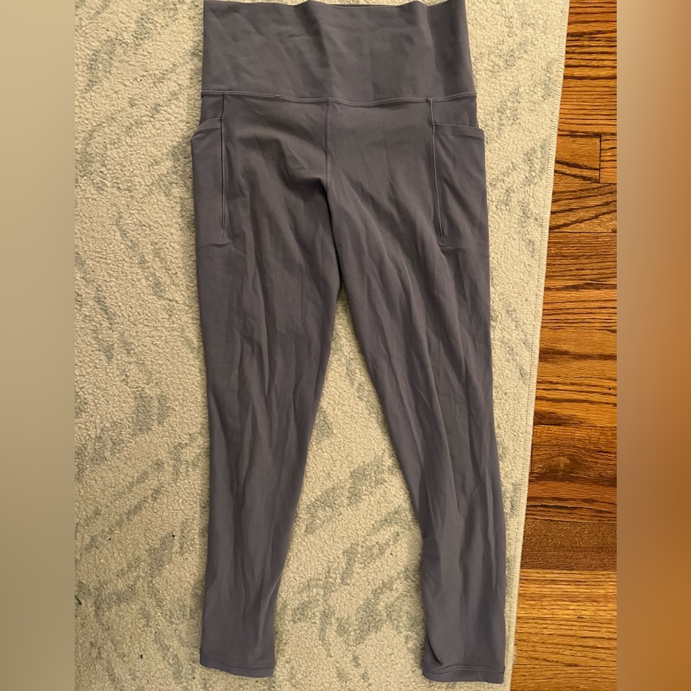 Athleta salutation stash pocket II 7/8 tight